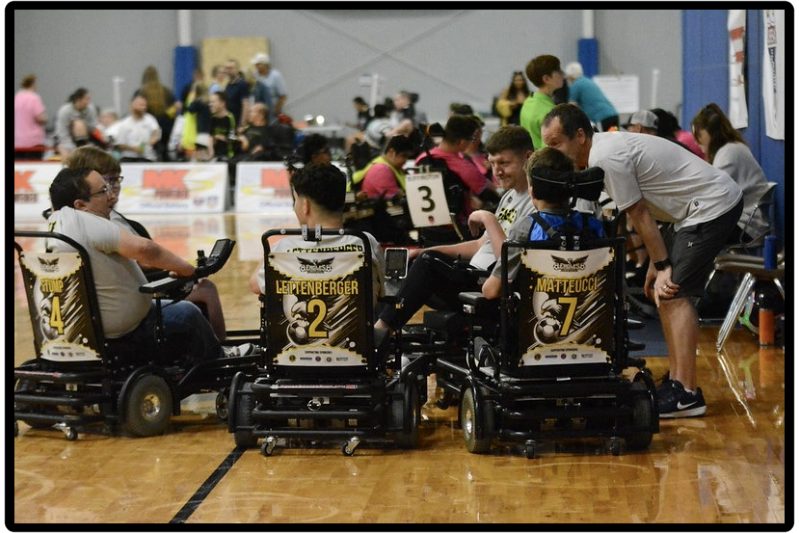 Players Lettenberger, Petzke, and Matteucci during a power soccer match